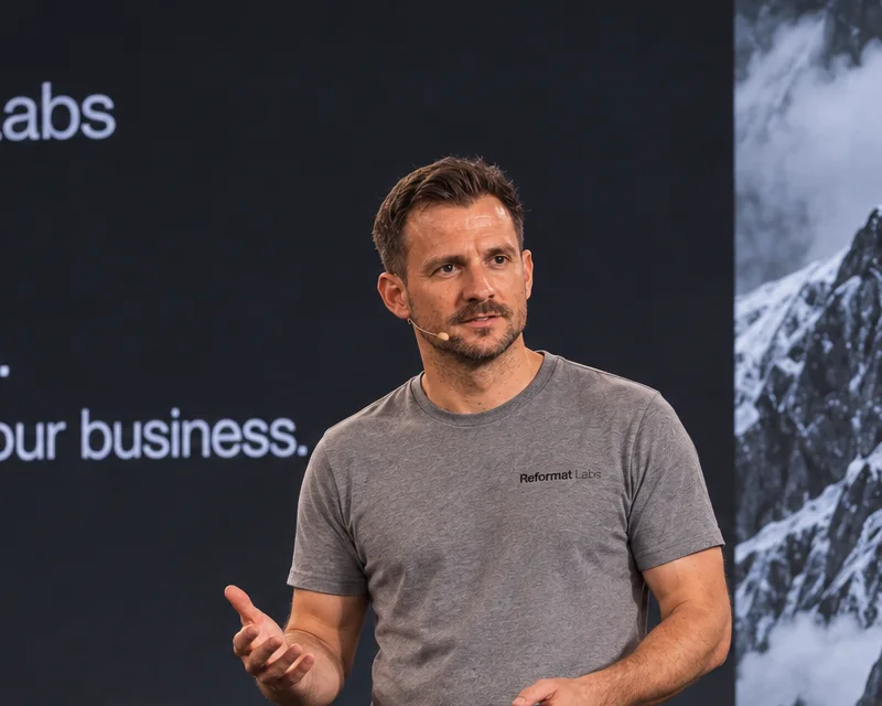 Jay Janes giving a talk on stage